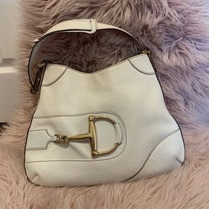 White hand bag